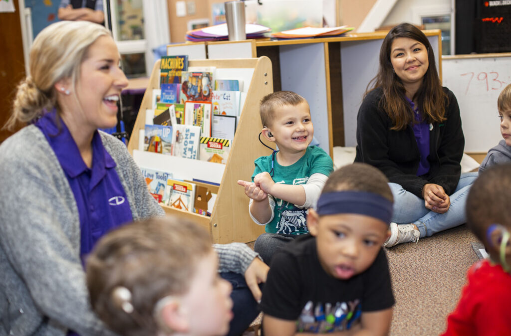 PACS professionals with young students